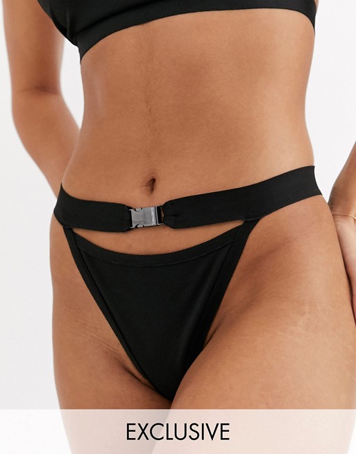 Candypants Exclusive bandage high leg buckle cut out bikini bottom in black