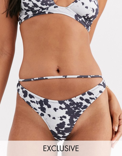 Candypants Exclusive high leg cut out bikini bottom in cow print