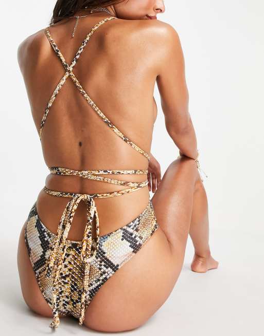 Candypants plunge front swimsuit with wrap detail in snake print