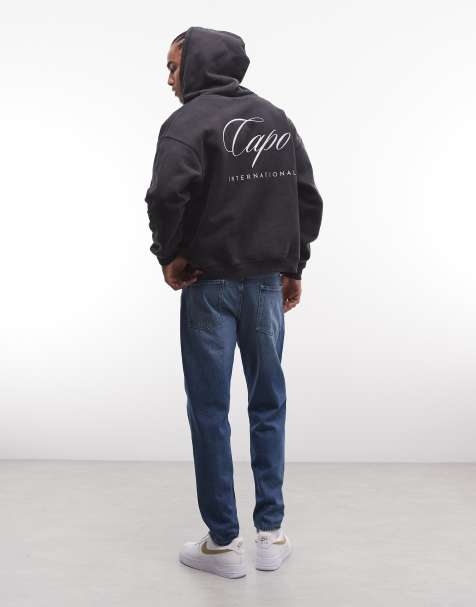 CAPO - Hoodie met rits en internationale logoprint op de achterkant in zwart - view 1