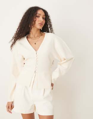 Cárdigan blanco hueso de punto compacto de Gina Tricot