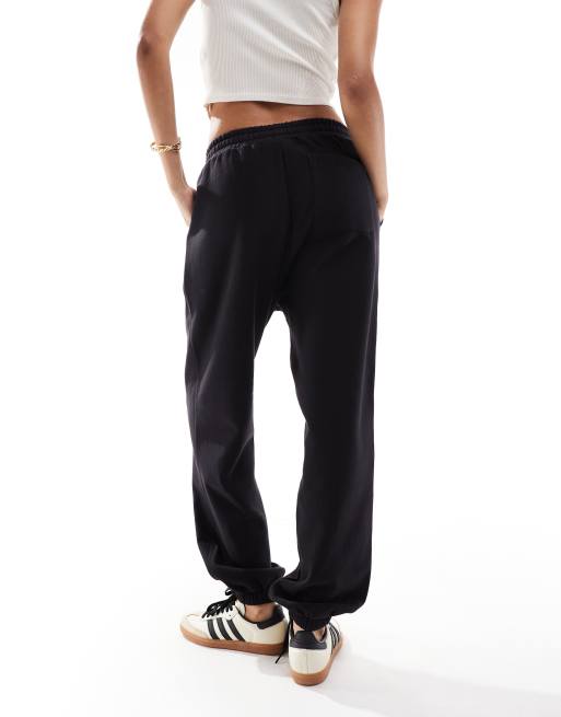 Carhartt WIP – American – Czarne joggersy z napisem, 2 z 5