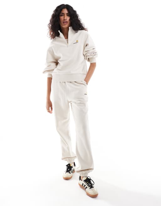 Carhartt WIP - American Script - Joggers color crema in coordinato