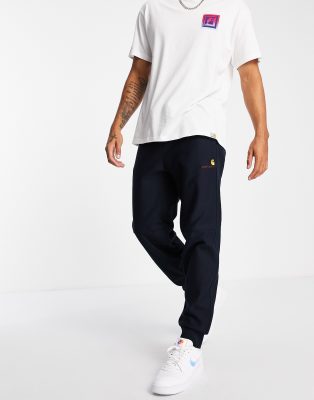Carhartt WIP - American Script - Joggingbroek in marineblauw CO | ASOS