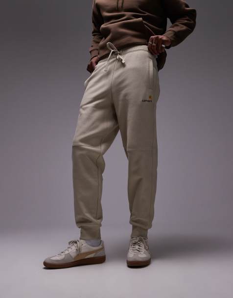 Carhartt WIP – American Script – Jogginghose in Beige - view 1