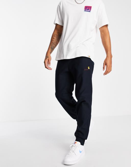 Carhartt WIP american script trackies in navy