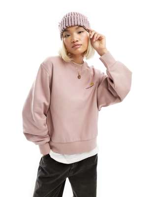 Carhartt WIP - American - Sweatshirt in Rosa mit Schriftzug