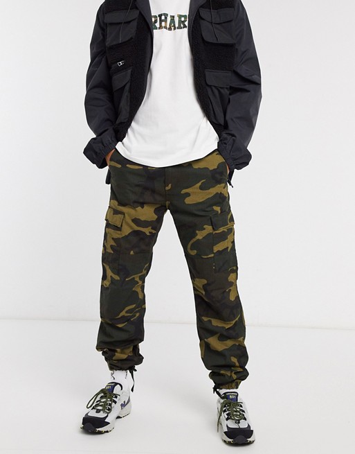 Carhartt WIP aviation cargo tapered trousers in camo