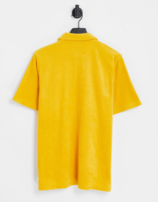 Carhartt WIP bayley polo in yellow