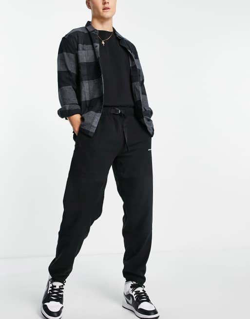 Carhartt WIP – Beaumont – Czarne polarowe joggersy