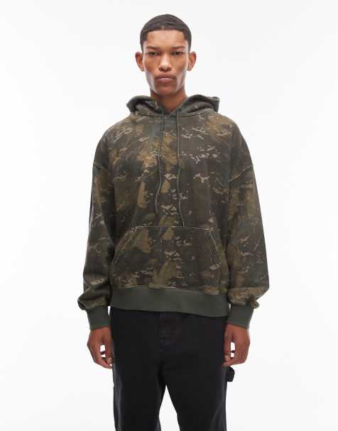 Carhartt WIP – Benton – Kastiger Kapuzenpullover mit grünem Camouflagemuster - view 1