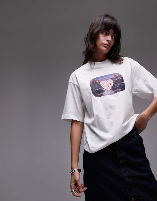 Carhartt WIP – Biały T-shirt z krótkim rękawem i napisem Greatest Flicks 