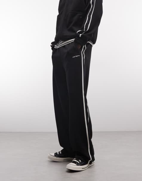 Carhartt WIP – Bolar – Jogginghose in Schwarz mit seitlichem Streifen, Kombiteil - view 1