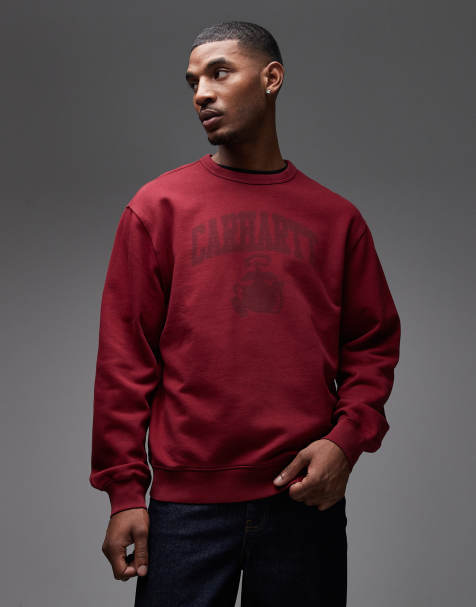 Carhartt WIP – Bordowa bluza oversize zakładana przez głowę z wyblakłym nadrukiem - view 1