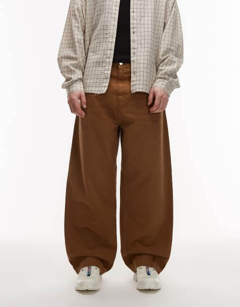 Carhartt WIP – Brandon – Brązowe luźne spodnie z prostymi nogawkami i przetarciami - view 1