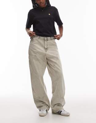Carhartt WIP - Brandon - Lockere Jeans in verwaschenem Kreidegrau mit Details an beiden Knien