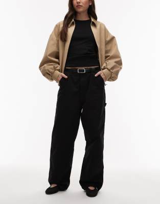 Carhartt WIP - Brandon - Loose-Fit-Jeans in Schwarz mit einlagiger Kniepartie