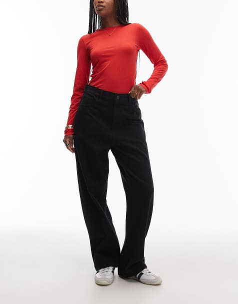 Carhartt WIP – Brandon – Luźne jeansy w ciemnym granatowym kolorze z efektem barwienia - view 1