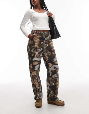 Carhartt WIP Carhartt WIP brandon single knee loose trousers in wild dog camo print-Multi