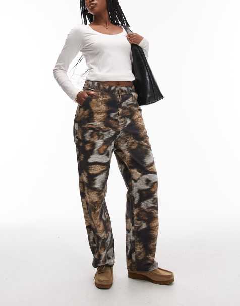 Carhartt WIP brandon single knee loose trousers in wild dog camo print