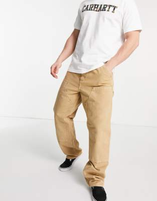 Carhartt WIP – Brązowe luźne spodnie w stylu roboczym z prostymi nogawkami, naszywkami i efektem sprania