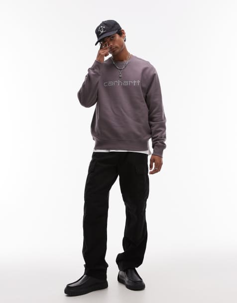 Carhartt WIP – Brun sweatshirt med text och nitar - view 1