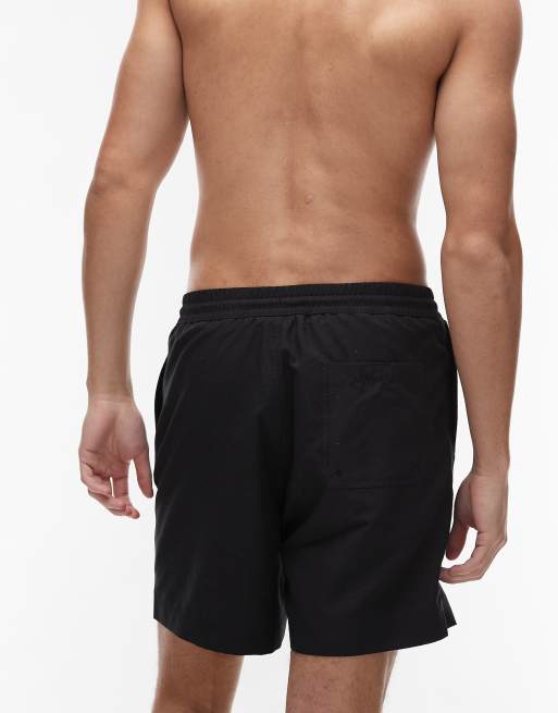 Carhartt WIP – Chase – Svarta badshorts, 4 av 4
