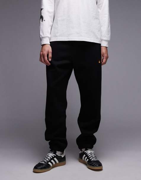 Carhartt WIP Chase sweatpants in black - view 1
