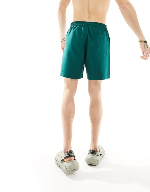 Carhartt WIP chase swim shorts in green, 4 of 4