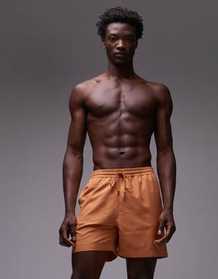 Carhartt WIP Carhartt WIP chase swim shorts in orange