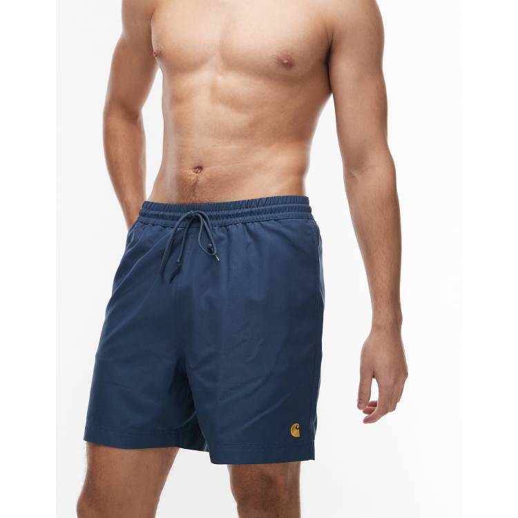 Carhartt WIP Chase swim trunks in dark blue | ASOS