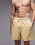 [Carhartt WIP] Carhartt WIP Chase swim trunks in yellow W40 Yellow