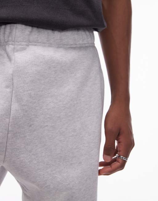Carhartt WIP Chase trackies in grey marl 
