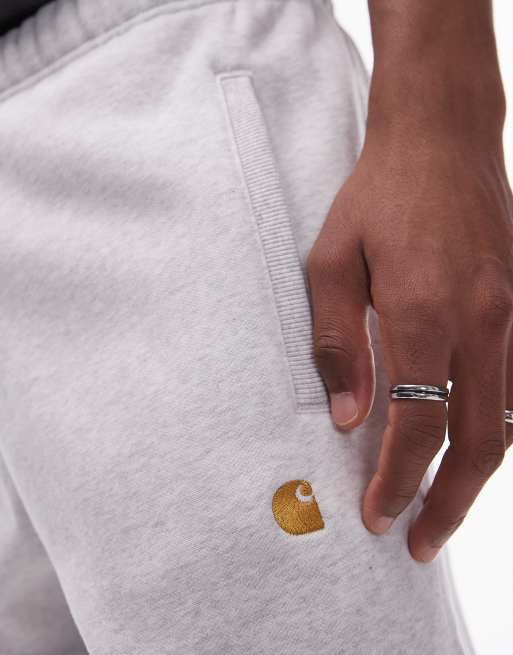 Carhartt WIP Chase trackies in grey marl 