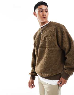 Carhartt WIP Carhartt WIP coordinate graphic borg sweatshirt in brown