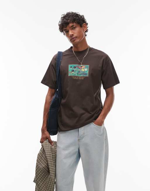 Carhartt WIP – Cream of the Crop – Brun, kort t-shirt med ledig passform och motiv