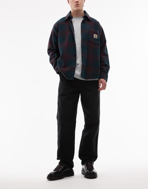 Carhartt WIP single knee straight leg trousers in black with abrasions