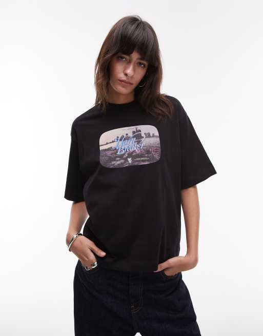 Carhartt WIP – Czarny T-shirt z krótkim rękawem i napisem Greatest Flicks 