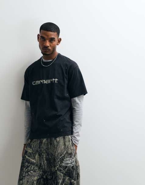 Carhartt WIP – Czarny T-shirt z plamami farby i logo z efektem sprayu - view 1