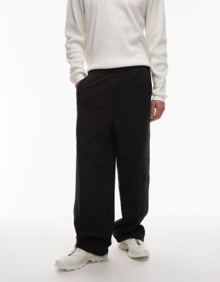 Carhartt WIP Carhartt WIP double knee baggy wide leg joggers in black