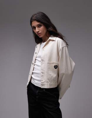 Carhartt WIP - Drewe - Jacke in Weiß mit Herz-Logo