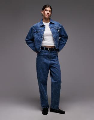 Carhartt WIP - Duck Orell - Jeans in Blau mit Military-Muster