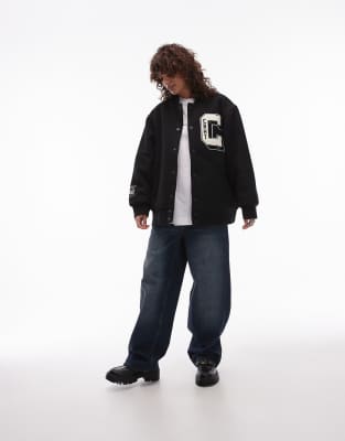 Carhartt WIP Carhartt WIP ducks varsity jacket in black