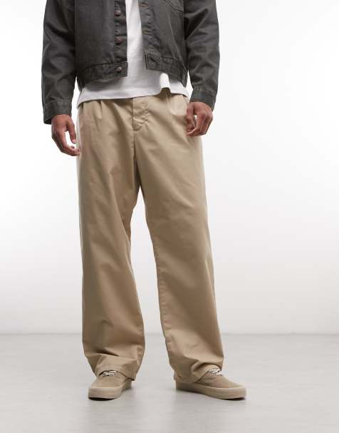 Carhartt WIP – Evan – Beige, avsmalnande byxor med ledig passform - view 1