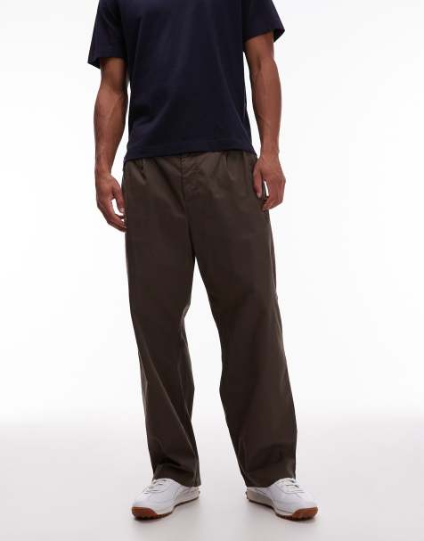 Carhartt WIP Evan loose tapered fit pants in brown - view 1