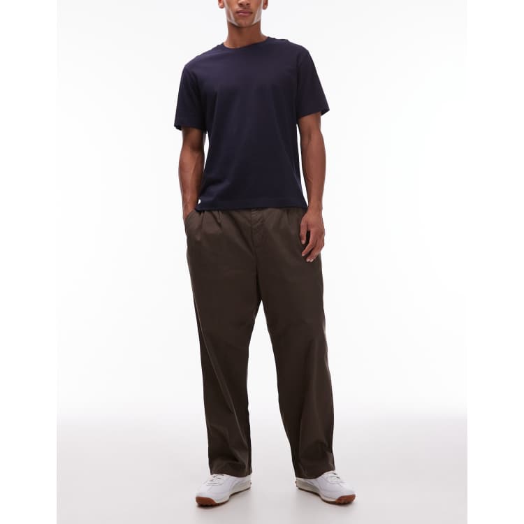 Carhartt WIP Evan loose tapered fit pants in brown ASOS