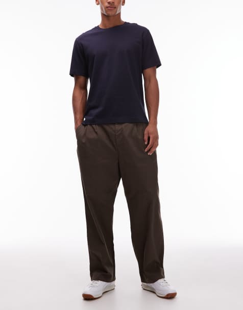 Carhartt WIP - Evan - Pantaloni affusolati ampi marroni - view 1