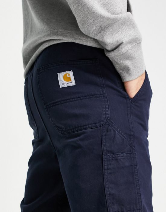 https://images.asos-media.com/products/carhartt-wip-flint-regular-tapered-pant-in-navy/202091152-4?$n_550w$&wid=550&fit=constrain