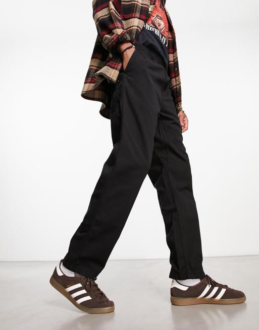 Carhartt WIP – Flint – Schmal zulaufende Hose in Schwarz mit normalem Schnitt