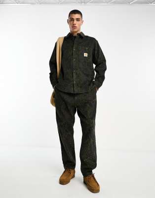 Carhartt WIP – Flint – Zielone sztruksy o regularnym kroju ze zwężanymi nogawkami we wzór paisley